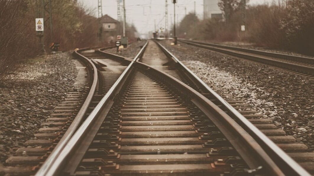 Sepia image of a railway line going off into the distance