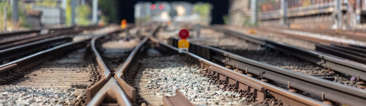 Close up of railway tracks and light signals